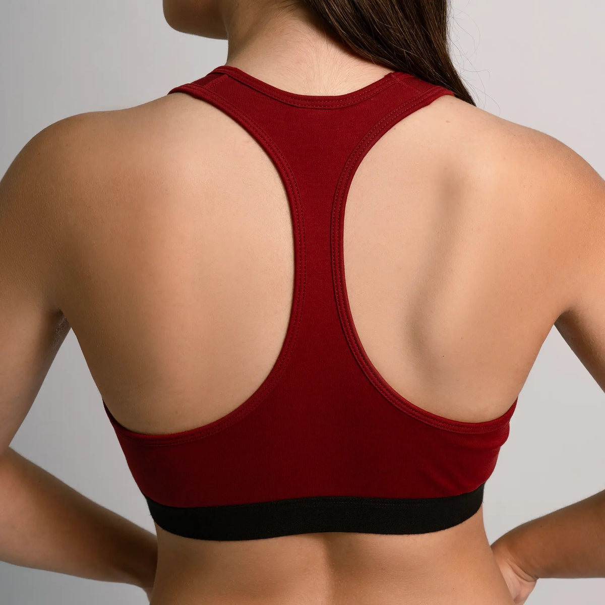 womens plastic free sports bra color maroon